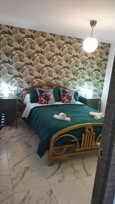 Cama o camas de una habitación en Sweet Home