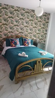 Cama o camas de una habitación en Sweet Home
