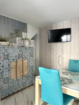 Una televisión o centro de entretenimiento en Sweet Home