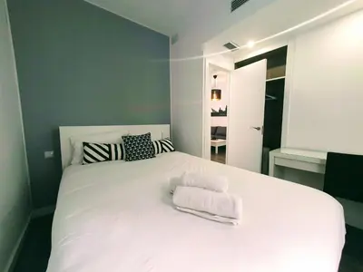 Cama o camas de una habitación en Recien renovado junto a Santa Justa y el centro