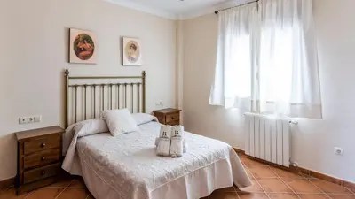Cama o camas de una habitación en Finca Cerro Alcolea Periana by Ruralidays