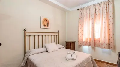 Cama o camas de una habitación en Finca Cerro Alcolea Periana by Ruralidays