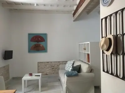 Una televisión o centro de entretenimiento en Apartamento 
