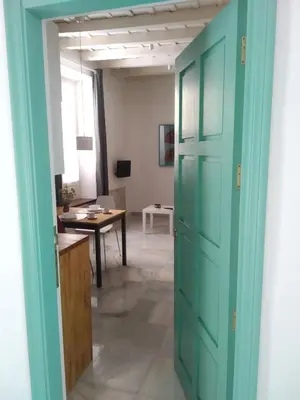 Una televisión o centro de entretenimiento en Apartamento 