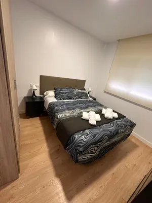Cama o camas de una habitación en APARTAMENTO CAMINO DEL RIO