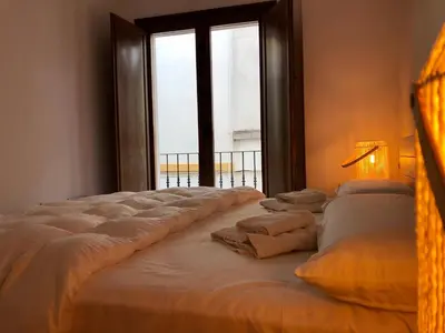 Cama o camas de una habitación en La Casa de La Escalera