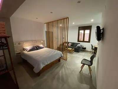 Cama o camas de una habitación en Apartamentos La Cámara I Córdoba Corredera