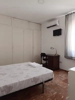 Cama o camas de una habitación en Piso dos dormitorios junto plaza Colón
