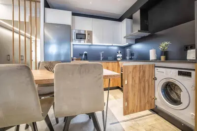 Una cocina o zona de cocina en NEW Loft Cabel & Parking Incluido