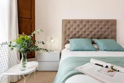 Cama o camas de una habitación en Palacio del siglo XVII frente a los Jardines de Murillo