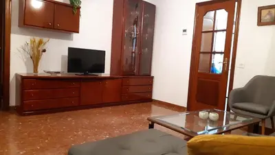 Una televisión o centro de entretenimiento en APARTAMENTO SAN LORENZO