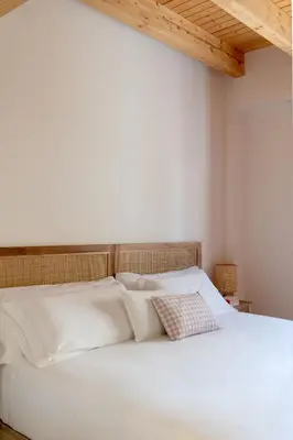 Cama o camas de una habitación en Hommyhome Sevilla Natural Passivhaus