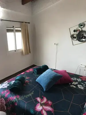 Cama o camas de una habitación en HACIENDA LA MACARENA DE SEVILLA