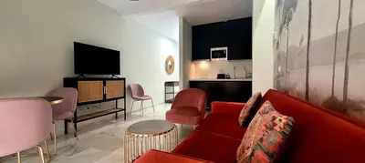 Una televisión o centro de entretenimiento en San Clemente House