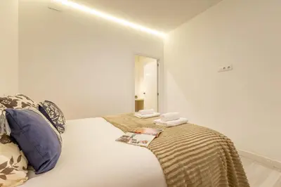 Cama o camas de una habitación en Resolana Suites