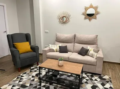 Zona de estar de Acogedor apartamento en la Buhaira