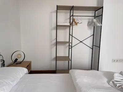 Cama o camas de una habitación en La Casa de La Escalera 2