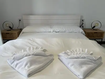 Cama o camas de una habitación en La Casa de La Escalera 2