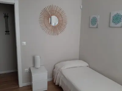 Cama o camas de una habitación en Feria Apartments