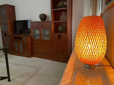 Una televisión o centro de entretenimiento en Apartamento Duplex El Tinte