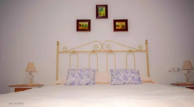 Cama o camas de una habitación en Modern Apartment in Peñaflor with Air Conditioning - 85 m²