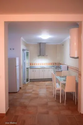 Una cocina o zona de cocina en Modern Apartment in Peñaflor with Air Conditioning - 85 m²