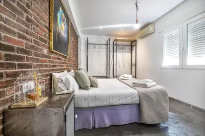 Cama o camas de una habitación en Moderno y céntrico apartamento en Tesoro 6