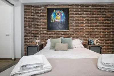 Cama o camas de una habitación en Moderno y céntrico apartamento en Tesoro 6