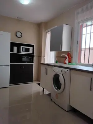 Una cocina o zona de cocina en Alojamiento en Bujalance