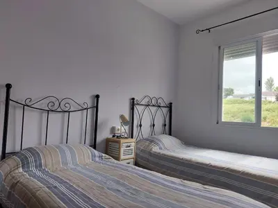 Cama o camas de una habitación en Alojamiento en Bujalance