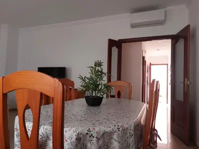 Una televisión o centro de entretenimiento en Alojamiento en Bujalance