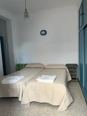 Cama o camas de una habitación en Bonito apartamento céntrico cerca de Sevilla