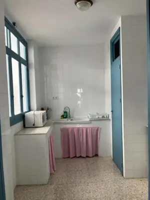 Una cocina o zona de cocina en Bonito apartamento céntrico cerca de Sevilla