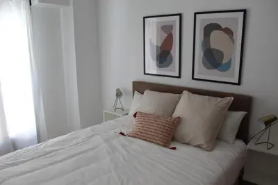 Cama o camas de una habitación en Ludyco Homes Las Murallas