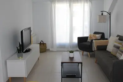 Una televisión o centro de entretenimiento en Ludyco Homes Las Murallas