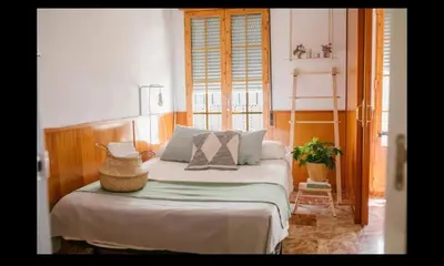 Cama o camas de una habitación en SunShine Mezquita