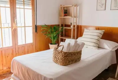 Cama o camas de una habitación en SunShine Mezquita