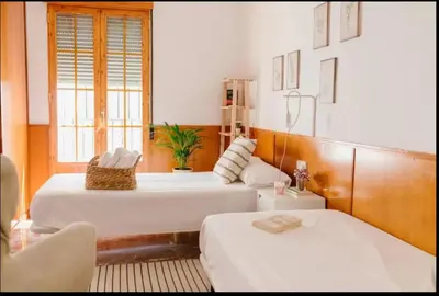 Cama o camas de una habitación en SunShine Mezquita