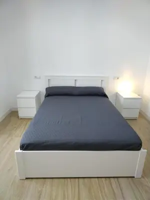 Cama o camas de una habitación en CASTRO Suites Osuna