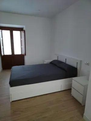 Cama o camas de una habitación en CASTRO Suites Osuna