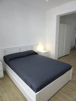 Cama o camas de una habitación en CASTRO Suites Osuna
