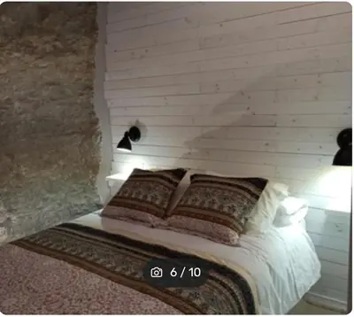 Cama o camas de una habitación en CASA ENROCADA
