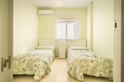Cama o camas de una habitación en Casa unifamiliar