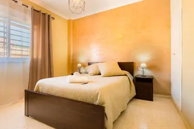 Cama o camas de una habitación en Casa unifamiliar