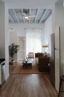 Zona de estar de One&Lux Puñonrostro Bright Minimalist Central Home