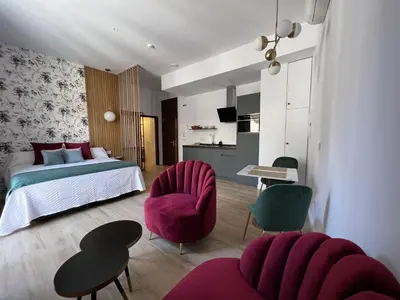 Cama o camas de una habitación en APARTAMENTOS TURISTICOS SINAG