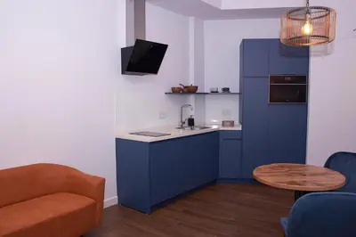 Una cocina o zona de cocina en APARTAMENTOS TURISTICOS SINAG