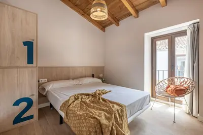 Cama o camas de una habitación en Cats Hostel Córdoba