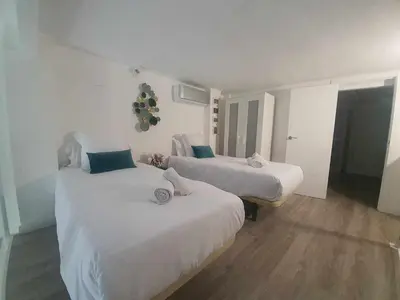 Cama o camas de una habitación en ISG Apartments Feria 106