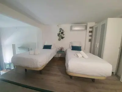 Cama o camas de una habitación en ISG Apartments Feria 106